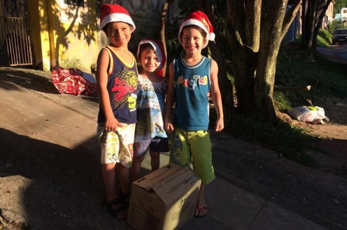 Papai Noel do DG distribuiu alegria e presentes com ajuda de leitores - Notícias Papai Noel do DG distribuiu alegria e presentes com ajuda de leitores - Notícias