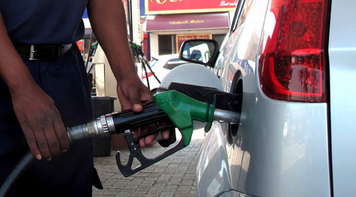 Image result for BUHARI CUTS PETROL PRICE TO N130
