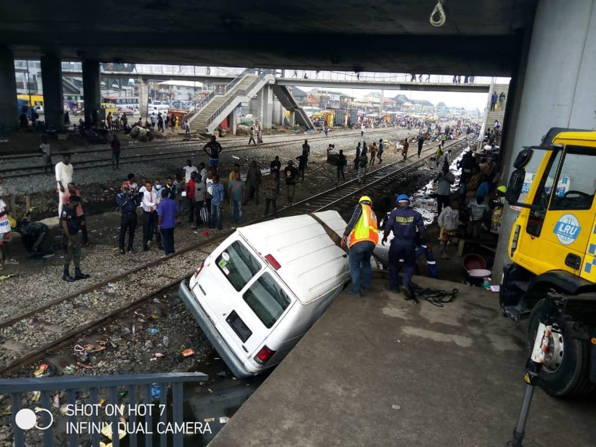 Passengers Narrowly Escape Death As Bus Collides With Moving Train In Lagos