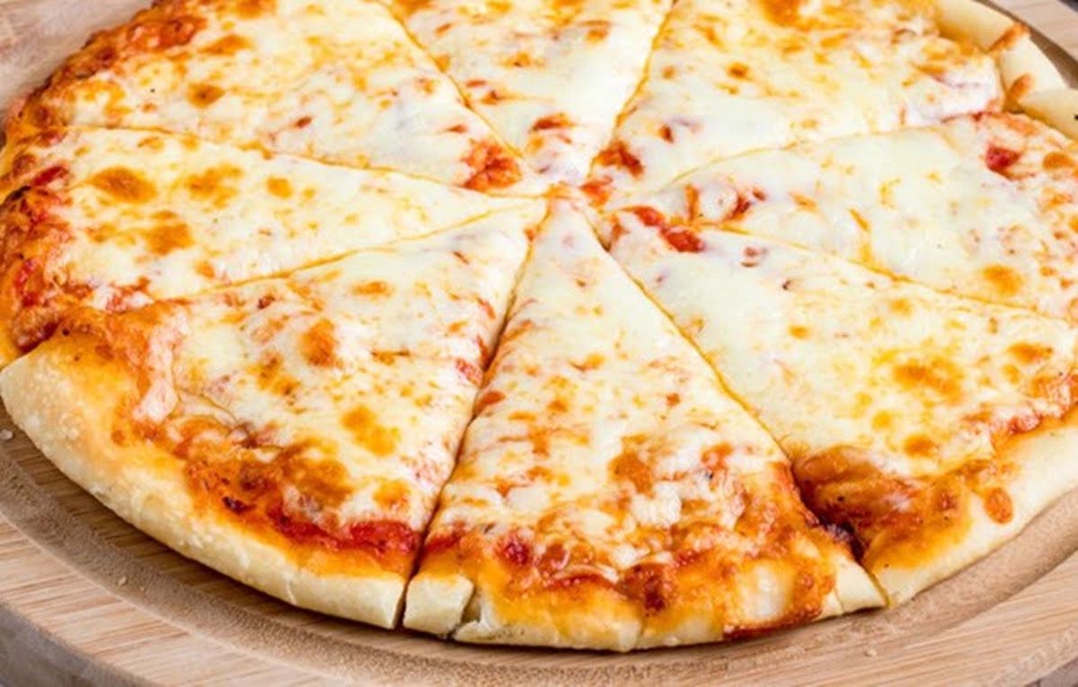 Pizza de jamón, queso y tocino · Recetas Fáciles